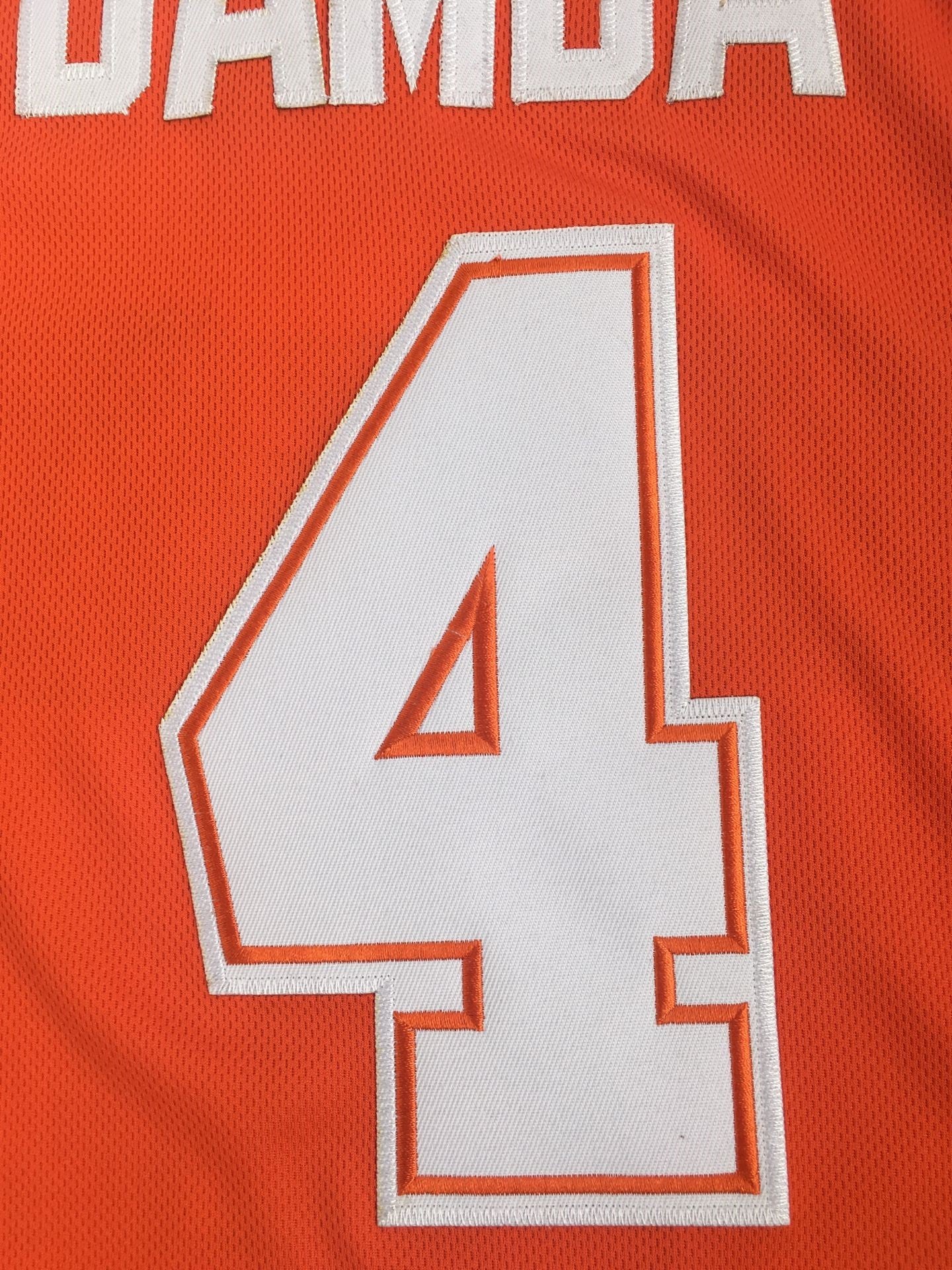 NCAA University of Texas No. 4 Bamba Orange White Embroidered Jersey